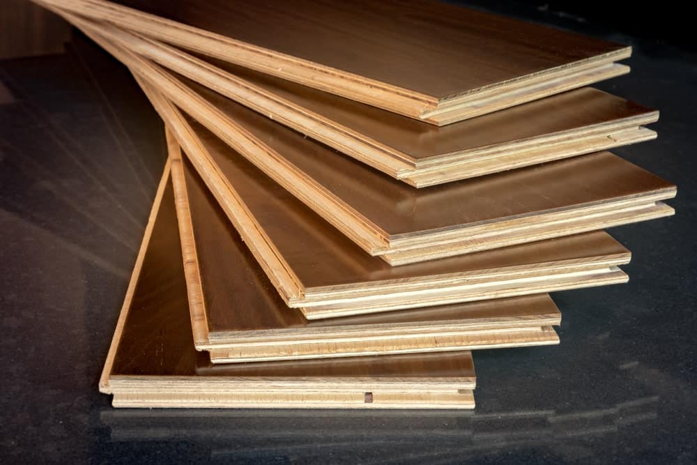 Stacked engineered hardwood planks.
